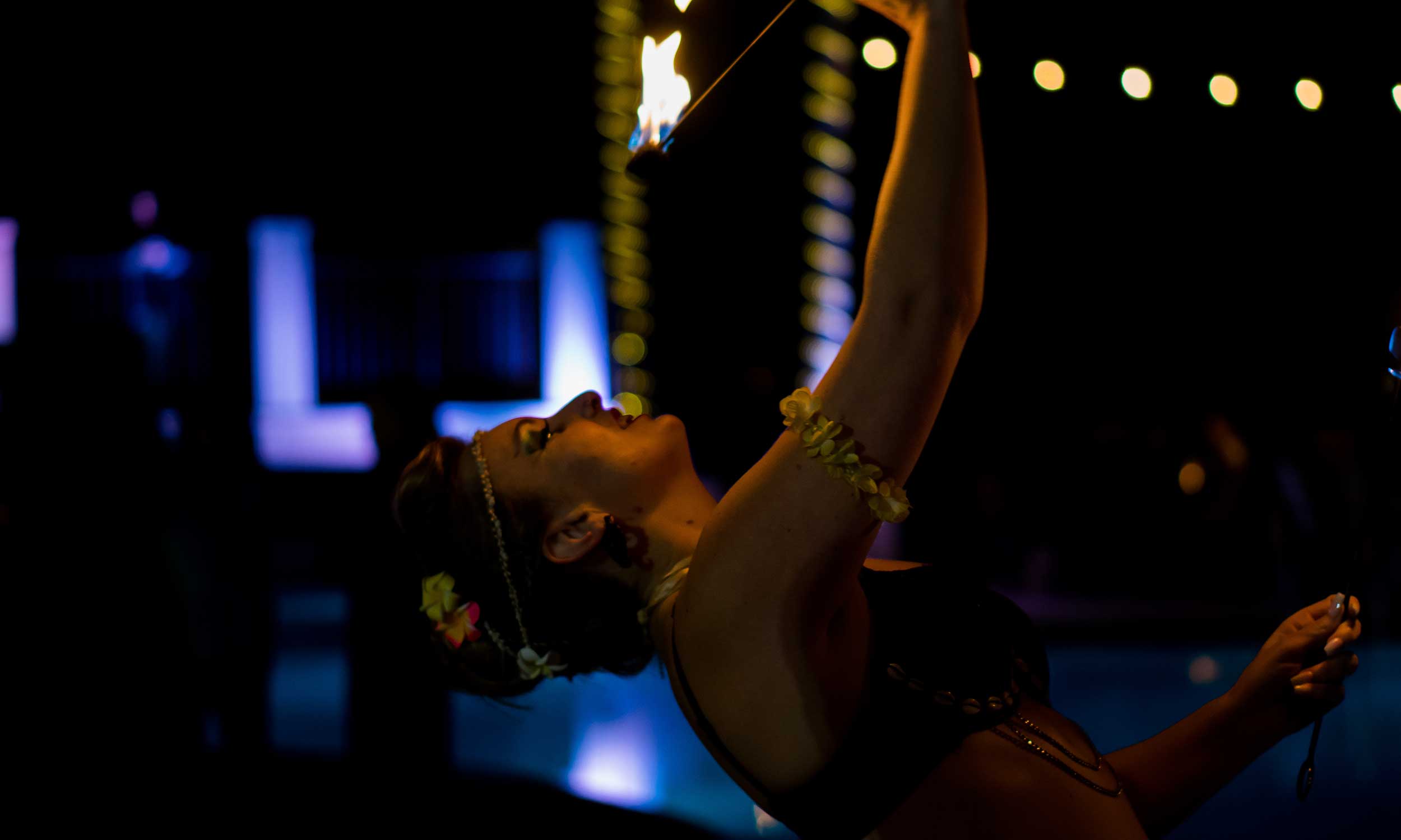Fire dancer at a fundraising gala by Foreman Productions, Inc.