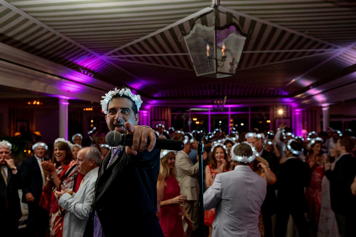 Lead performer of Society Hill entertaining a crowded dance floor at a Naples, Florida wedding