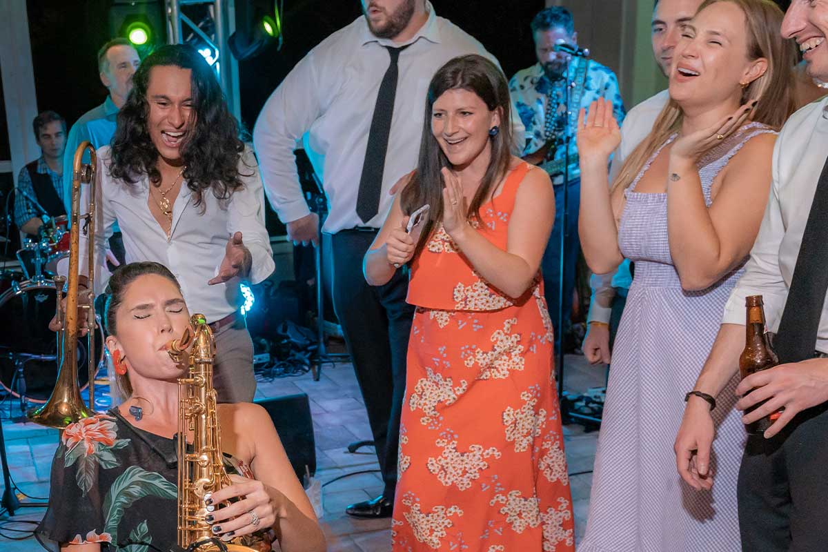The Brett Foreman Band musicians entering guests at Naples Florida wedding
