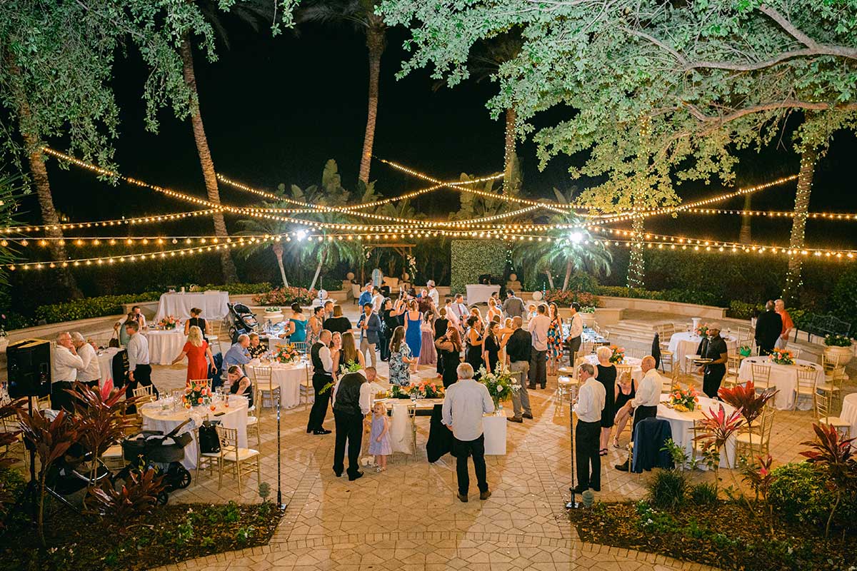 Outdoor courtyard reception in Naples, Florida produced by Foreman Productions