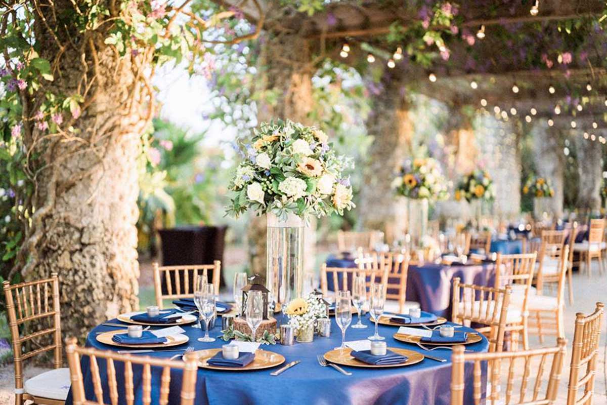 Table settings at the Naples Botanical Gardens for a wedding by Foreman Productions, Inc.